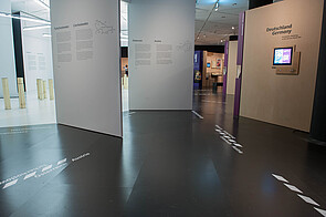 View of the introductory section: wooden steles in the foreground, country texts, biographies, and objects in the background