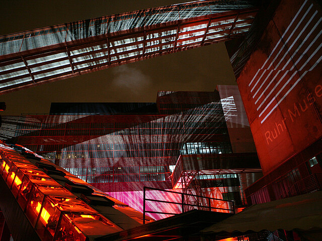 Illuminated building of the coal wash during the opening ceremony of the museum